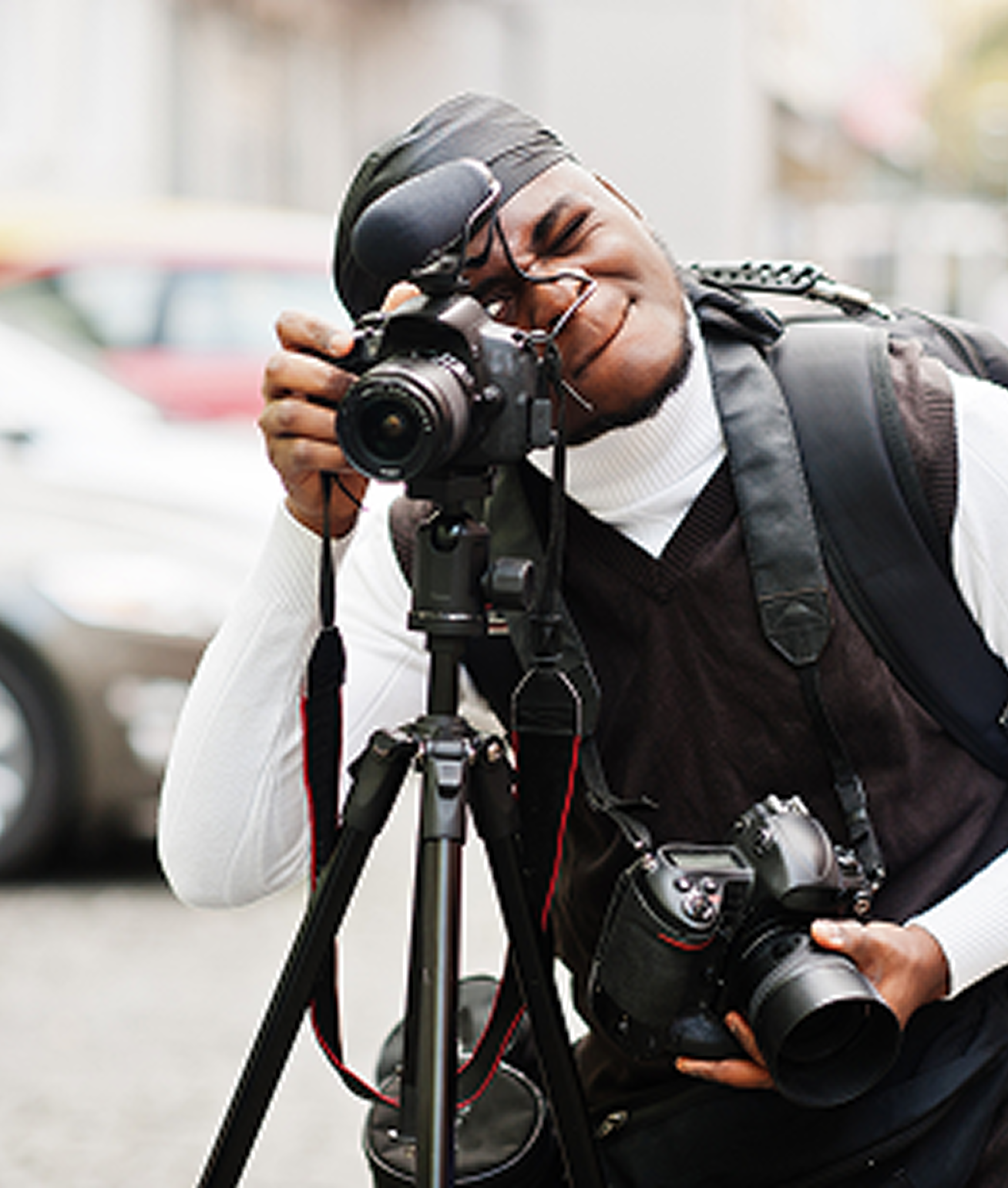 Professional photographer with camera equipment